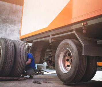 tire_truck A Big Truck Wheels and Tires. Truck Spare Wheels Tyre Waiting For to Change. Trailer Maintenace and Repairing.